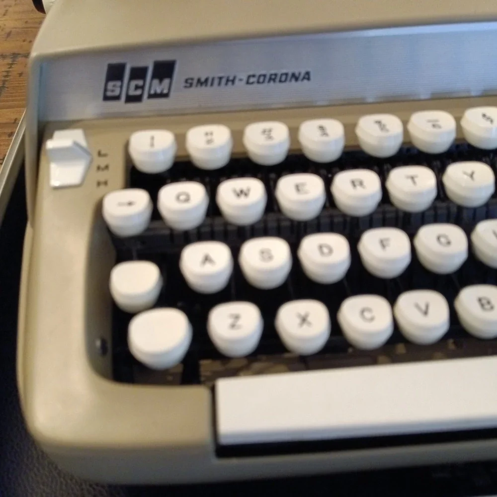 SCM Smith-Corona Super Sterling Portable Manual Typewriter with Case and Key